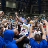 Norris Cole celebrates with team and fans while the Osos Fans chants MVP